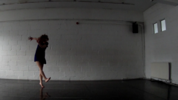 A figure moving in the Small studio at CDS