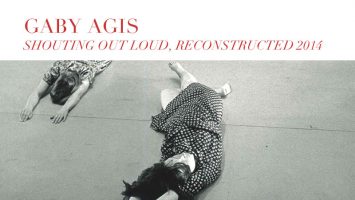 Two woman lay on the floor, promotional image for Shouting Out Loud, Reconstructed 2014, by Gaby Agis
